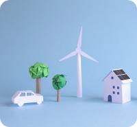 Energiebilanz verbessern – Ein Haus, Baum, Auto und Windrad aus Papier.